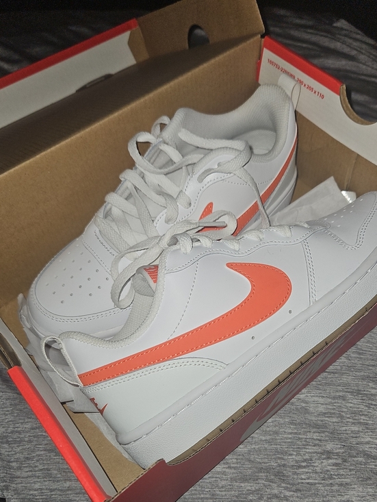 Nike Shoes - Nike White Low-Top Sneakers with Orange Swoosh